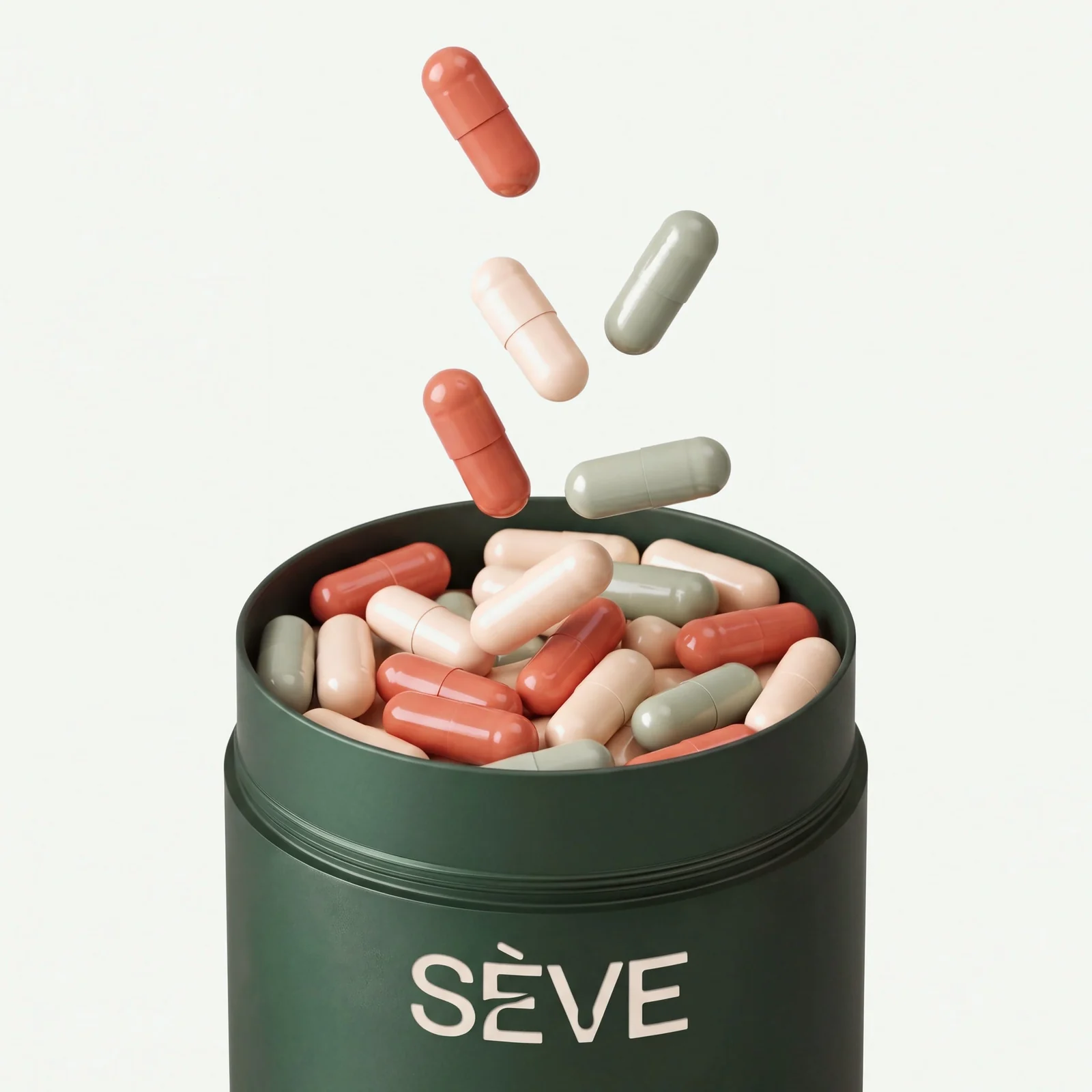 Gélules terracotta, crème et vert sauge tombant dans un pot de compléments SÈVE ouvert